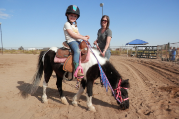 Mom and daughter riders
